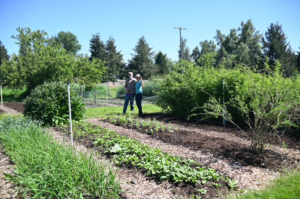 Jim Wallace and Gabrielle Chavez on the farm